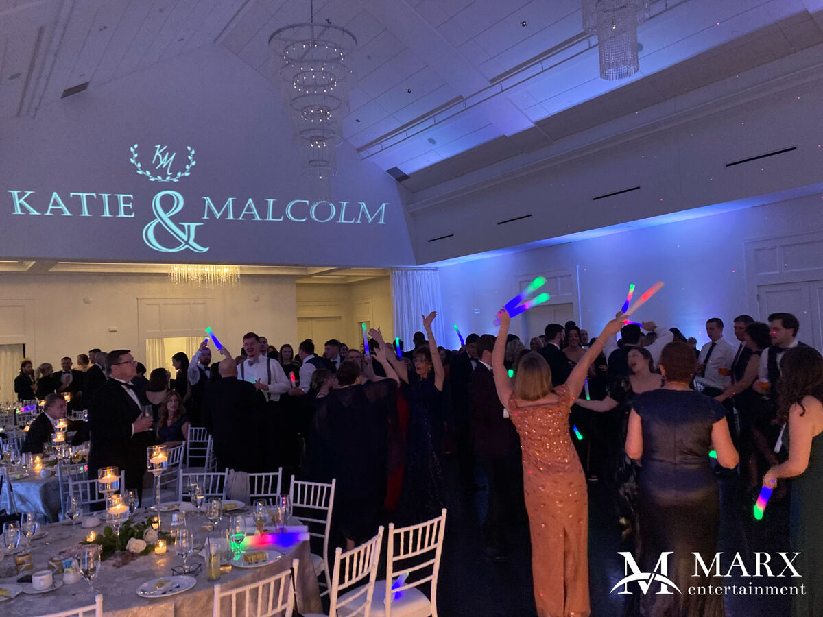 Monogram projection at a MARX entertainment wedding