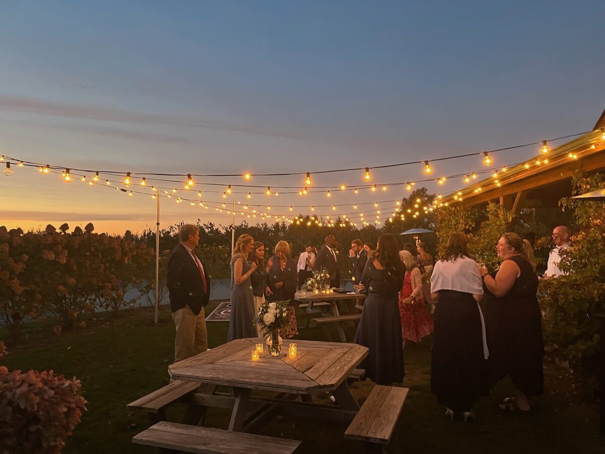 Outdoor bistro lighting at a wedding venue by MARX entertainment